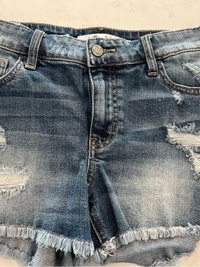 Distressed Mid-Rise Blue Denim Shorts with Frayed Hem